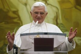 Pope Benedict XVI greets the faithful during his Sunday Angelus prayer at his summer residence of Castelgandolfo